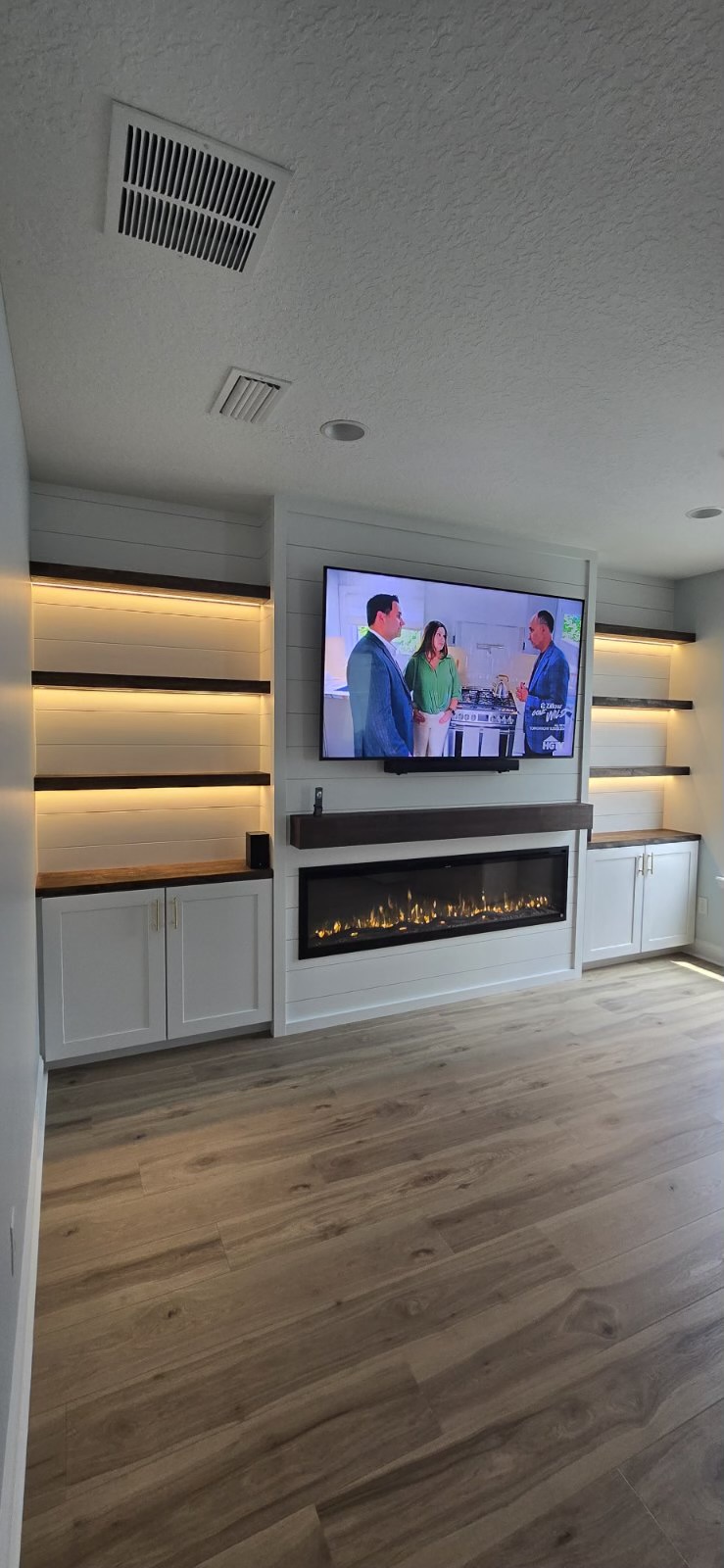 After: TV Entertainment Centers by AVP Construction JAX in RiverTown, Fruit Cove, FL