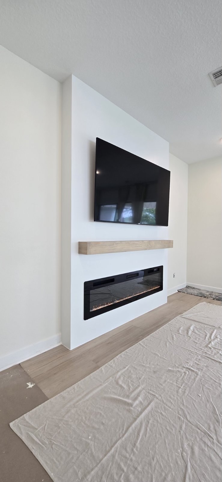 After: TV Entertainment Centers by AVP Construction JAX in ETown, Jacksonville, FL