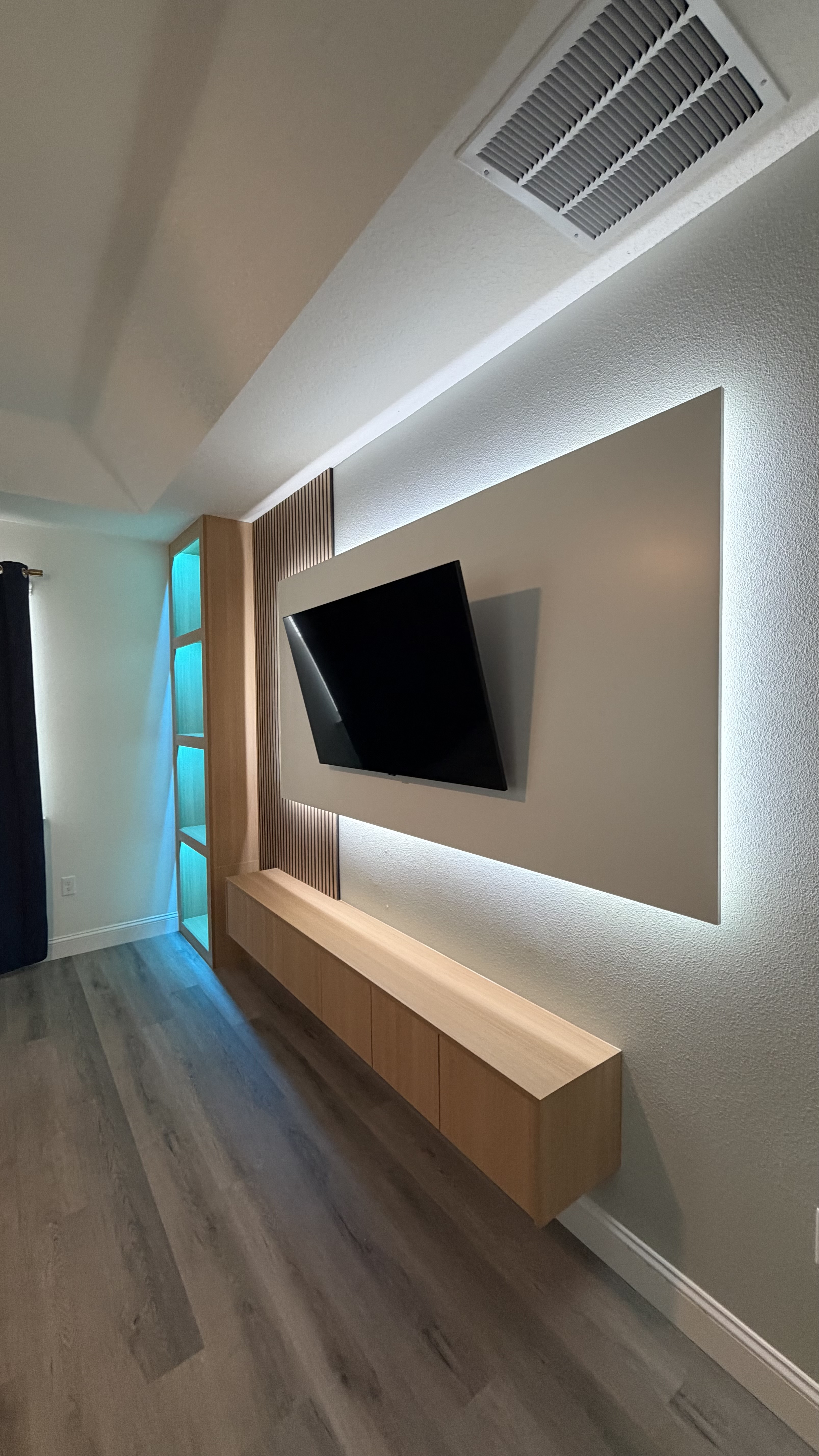 After: TV Entertainment Centers by AVP Construction JAX in Sabal Estates, St. Augustine, FL