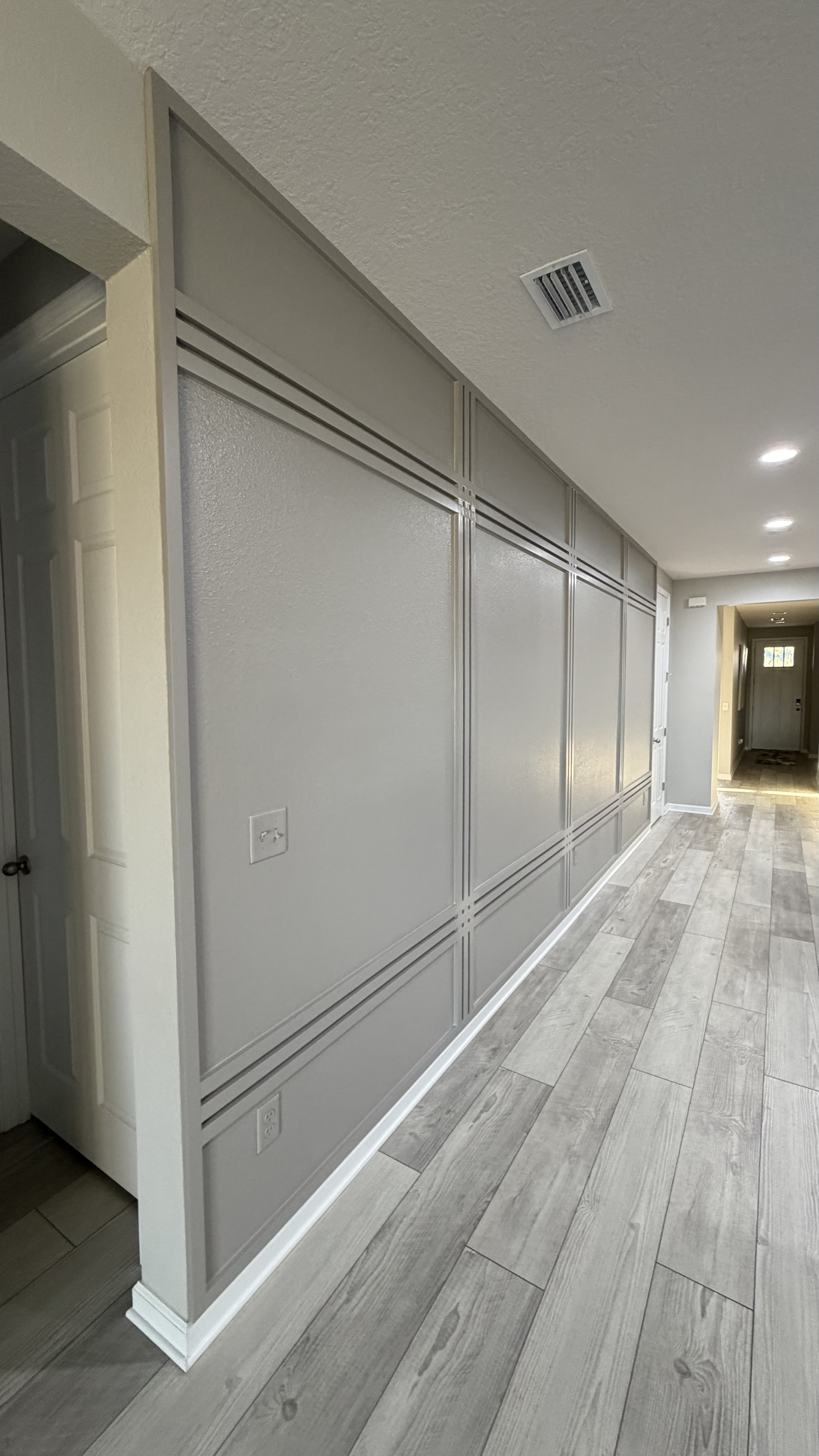 After: TV Entertainment Centers by AVP Construction JAX in Forest Trails, Jacksonville, FL